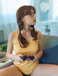 Gamer girl Satin Stone slowly spreads her pussy and posing nude